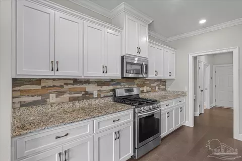 Kitchen - 1555 Cadence Loop, Cantonment, FL 32533 photo 5 of 5
