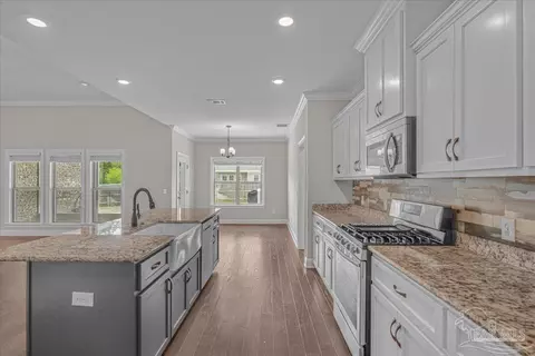 Kitchen - 1555 Cadence Loop, Cantonment, FL 32533 photo 4 of 5