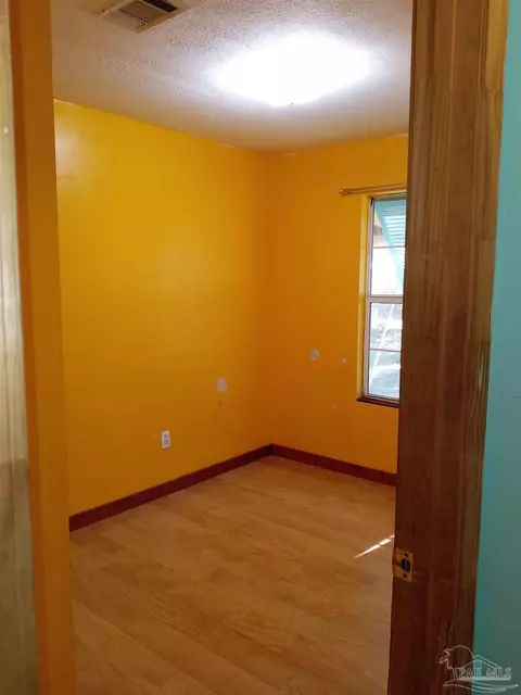 Bedroom - 5721 Pine Dr, Milton, FL 32583 photo 3 of 3