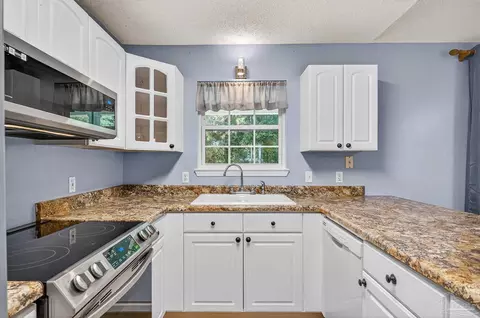 Kitchen - 5898 Cedar Tree Dr, Milton, FL 32570 photo 2 of 3