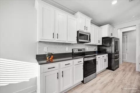 Kitchen - 6094 Cherry Hill Cir, Pace, FL 32571 photo 4 of 7