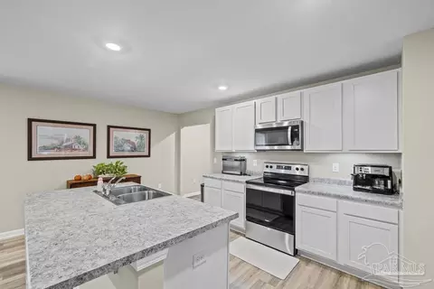 Kitchen - 5455 Peach Dr, Pace, FL 32571 photo 3 of 6