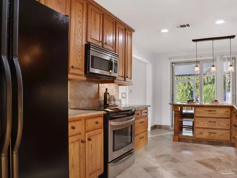 Kitchen - 5748 Dove Dr, Pace, FL 32571 photo 3 of 9