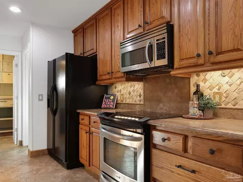 Kitchen - 5748 Dove Dr, Pace, FL 32571 photo 2 of 9