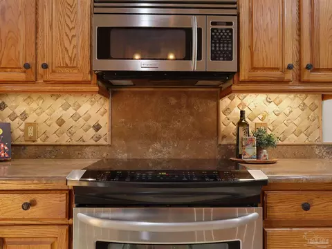 Kitchen - 5748 Dove Dr, Pace, FL 32571 photo 5 of 9