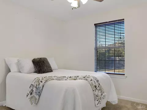 Bedroom - 5748 Dove Dr, Pace, FL 32571 photo 9 of 12