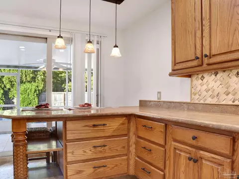 Kitchen - 5748 Dove Dr, Pace, FL 32571 photo 7 of 9