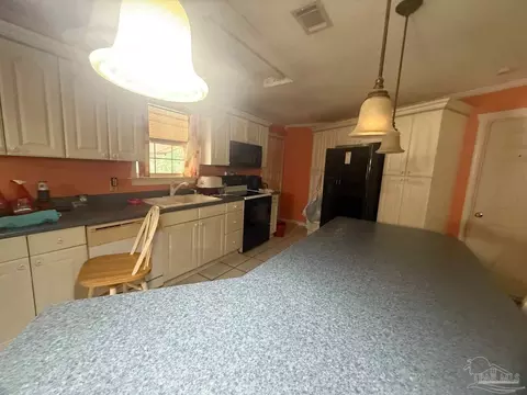 Kitchen - 4751 W Spencer Field Rd, Pace, FL 32571 photo 1 of 2