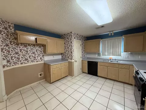 Kitchen - 7748 Rustling Pines Dr, Milton, FL 32583 photo 2 of 2