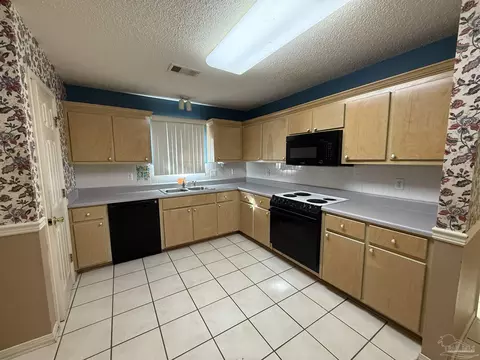 Kitchen - 7748 Rustling Pines Dr, Milton, FL 32583 photo 1 of 2