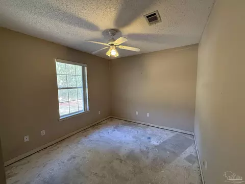 Bedroom - 7748 Rustling Pines Dr, Milton, FL 32583 photo 3 of 4