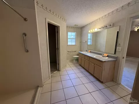 Bath - 7748 Rustling Pines Dr, Milton, FL 32583 photo 2 of 3