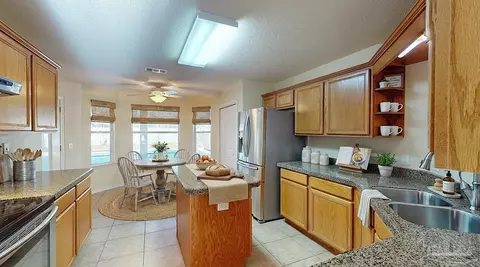 Kitchen - 5459 Education Dr, Pace, FL 32571 photo 1 of 6