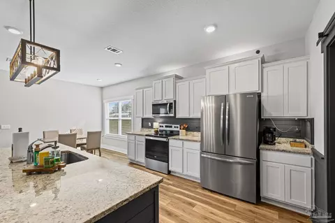Kitchen - 7628 Dewey Jernigan Rd, Pace, FL 32571 photo 2 of 2