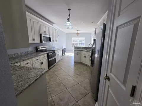 Kitchen - 4147 Lancaster Gate Dr, Pace, FL 32571 photo 4 of 4
