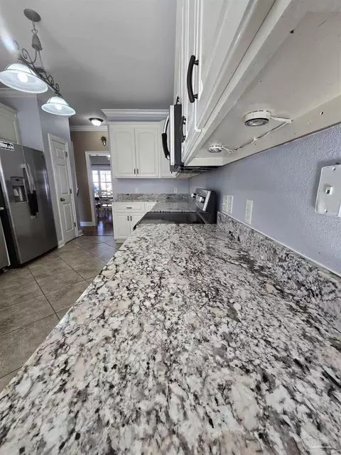 Kitchen - 4147 Lancaster Gate Dr, Pace, FL 32571 photo 2 of 4