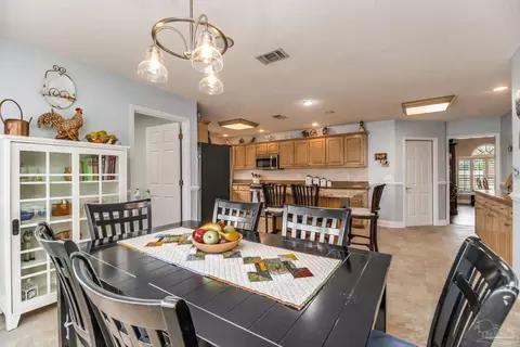 Dining - 3106 Cobblestone Dr, Pace, FL 32571 photo 5 of 8