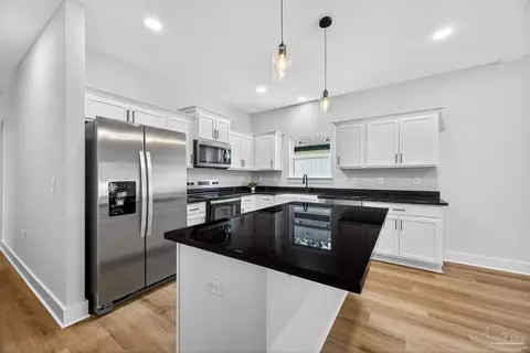 Kitchen - 2976 N 25th Ave, Milton, FL 32583 photo 2 of 7