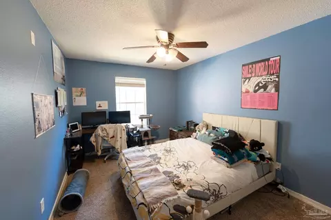 Bedroom - 5565 Whispering Woods Dr, Pace, FL 32571 photo 4 of 7