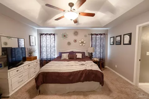 Bedroom - 5565 Whispering Woods Dr, Pace, FL 32571 photo 2 of 7
