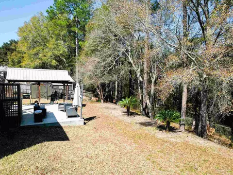 Exterior - 5565 Whispering Woods Dr, Pace, FL 32571 photo 15 of 16