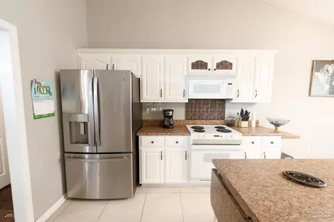 Kitchen - 5565 Whispering Woods Dr, Pace, FL 32571 photo 2 of 5