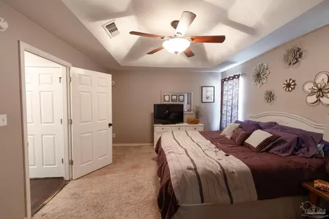 Bedroom - 5565 Whispering Woods Dr, Pace, FL 32571 photo 1 of 7