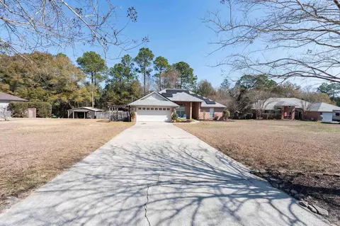 Exterior - 5565 Whispering Woods Dr, Pace, FL 32571 photo 13 of 16