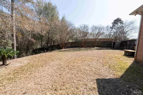 Exterior - 5565 Whispering Woods Dr, Pace, FL 32571 photo 11 of 16