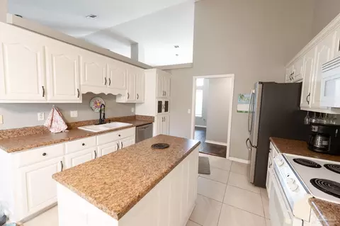 Kitchen - 5565 Whispering Woods Dr, Pace, FL 32571 photo 4 of 5