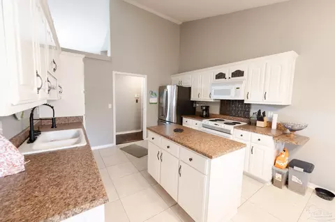 Kitchen - 5565 Whispering Woods Dr, Pace, FL 32571 photo 5 of 5