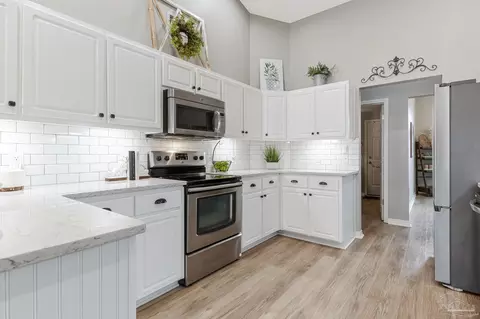 Kitchen - 2407 Pine Forest Rd, Cantonment, FL 32533 photo 2 of 4