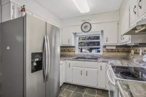Kitchen - 6589 Cedar St, Milton, FL 32570 photo 2 of 3