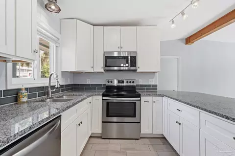 Kitchen - 6473 Lakeshore Dr, Milton, FL 32570 photo 3 of 3