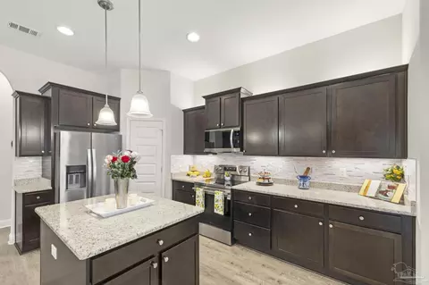 Kitchen - 4566 Red Oak Dr, Milton, FL 32583 photo 4 of 6