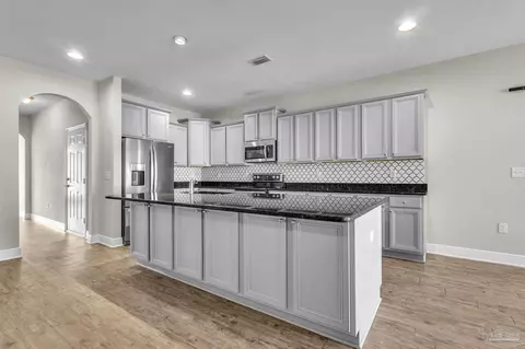 Kitchen - 5865 W Cambridge Way, Pace, FL 32571 photo 5 of 5