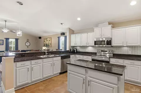 Kitchen - 5808 Dunridge Dr, Pace, FL 32571 photo 4 of 7