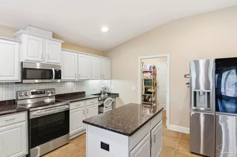 Kitchen - 5808 Dunridge Dr, Pace, FL 32571 photo 7 of 7