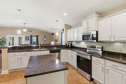 Kitchen - 5808 Dunridge Dr, Pace, FL 32571 photo 5 of 7