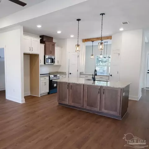 Kitchen - 4046 Woodfin Cir, Pace, FL 32571 photo 3 of 4