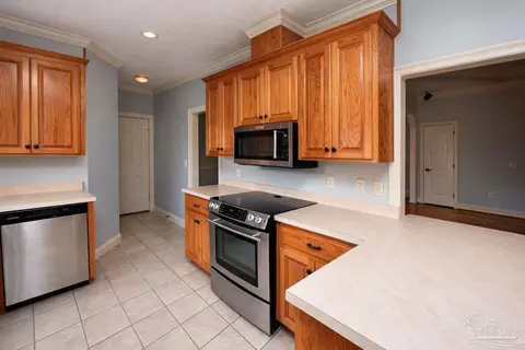 Kitchen - 4232 N Cambridge Way, Pace, FL 32571 photo 2 of 3