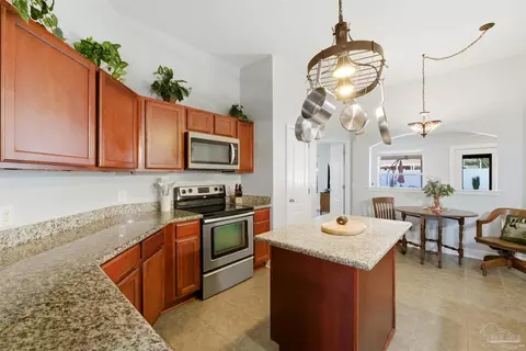 Kitchen - 5484 Covered Bridge Ln, Pace, FL 32571 photo 3 of 4