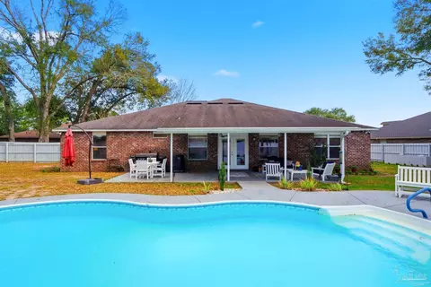 Exterior - 5484 Covered Bridge Ln, Pace, FL 32571 photo 9 of 11