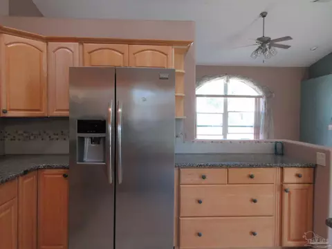 Kitchen - 5717 Loring Dr, Milton, FL 32583 photo 11 of 11