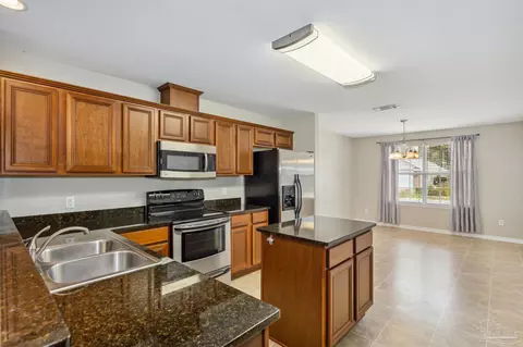Kitchen - 5933 Dunridge Dr, Pace, FL 32571 photo 1 of 2