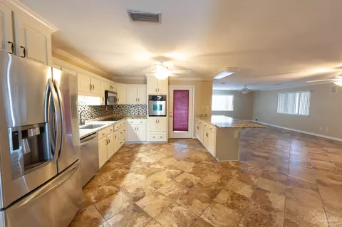 Kitchen - 7608 River Rd, Milton, FL 32583 photo 3 of 3