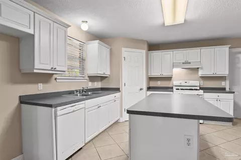 Kitchen - 3243 Moss Pt Ln, Cantonment, FL 32533 photo 1 of 2