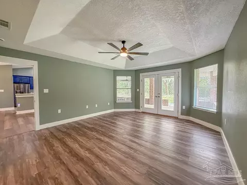 Living - 6020 Enfinger Rd, Pace, FL 32571 photo 2 of 6