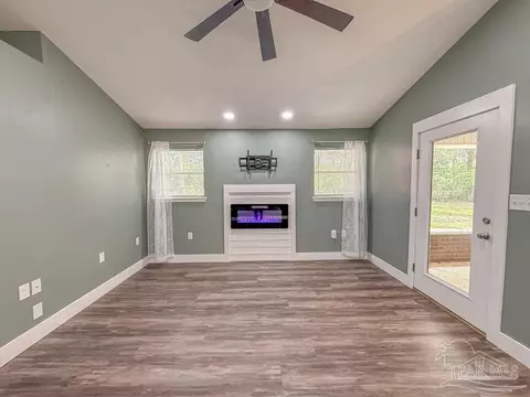 Living - 6020 Enfinger Rd, Pace, FL 32571 photo 4 of 6
