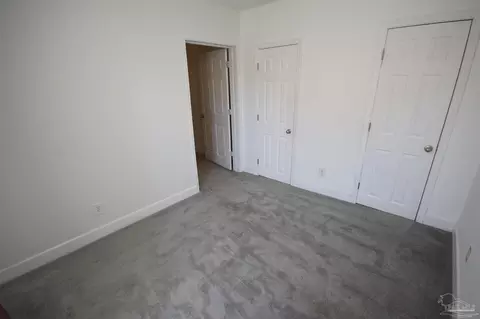 Bedroom - 4308 Floridatown Rd, Pace, FL 32571 photo 10 of 11